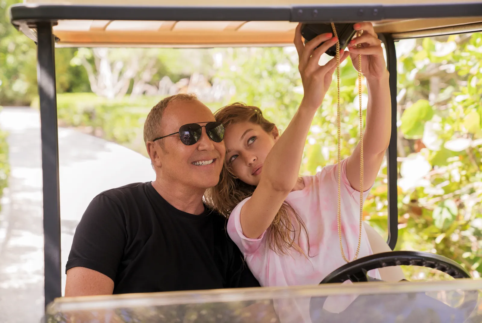 Michael Kors and Gigi Hadid behind the scenes during Wonderlust campaign